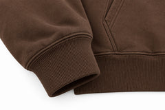 Close-up of the seam stitching of the Heritage Stitch brown felt appliqué hoodie