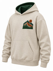 Front three-quarter view of the Mountain Patch oatmeal felt appliqué hoodie