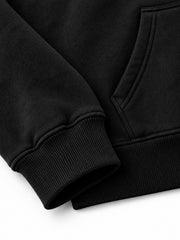 Close-up of the cuff and hem rib of the Flock Panther black flock print oversized hoodie