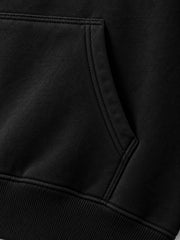 Close-up of the seam stitching of the Flock Panther black flock print oversized hoodie