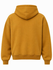 Back view of the Velvet Maze ochre flock print boxy hoodie with plain back