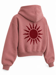 Rear three-quarter view of the Velvet Sun dusty rose flock print cropped hoodie