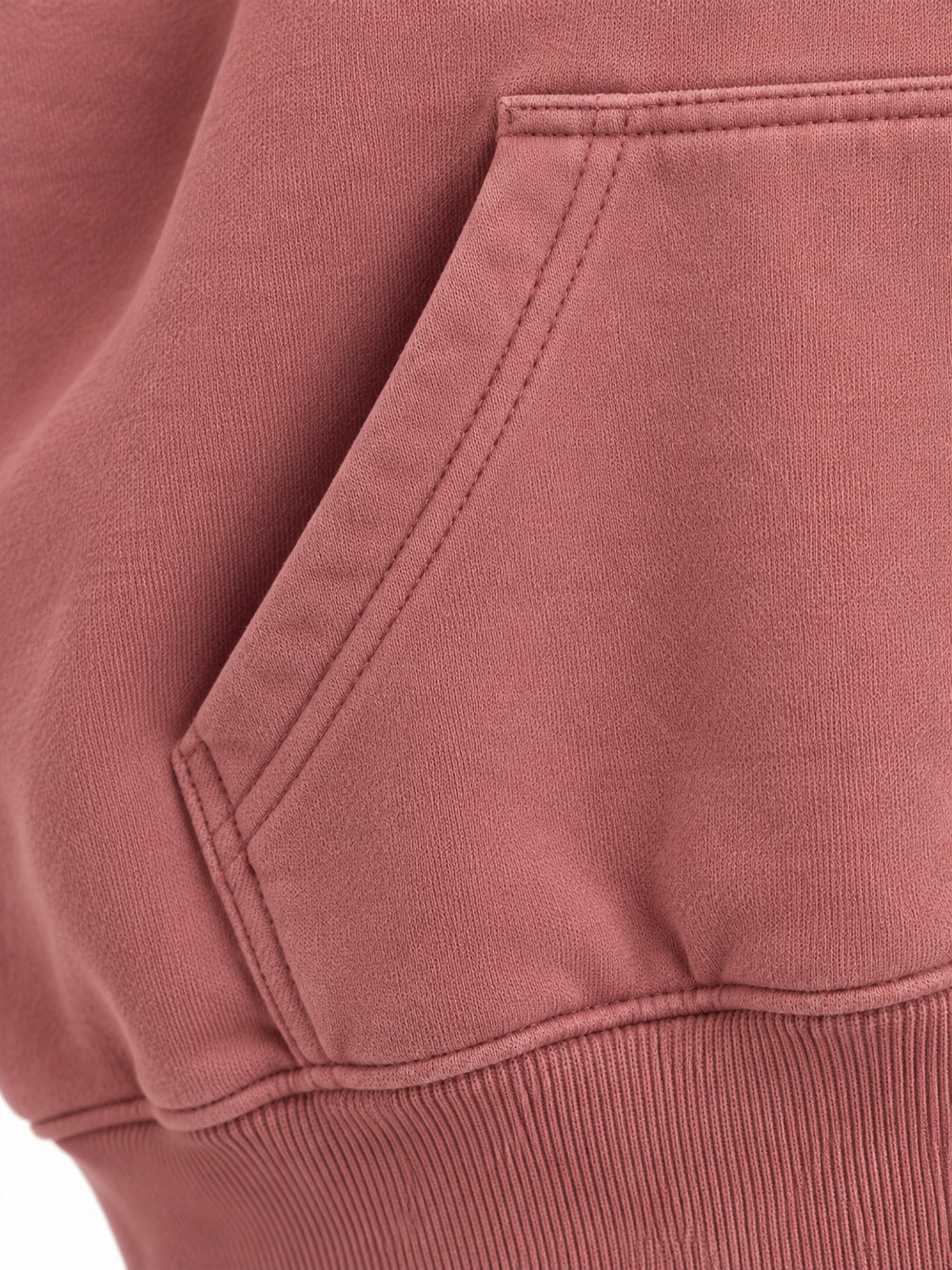 Close-up of the seam stitching of the Velvet Sun dusty rose flock print cropped hoodie