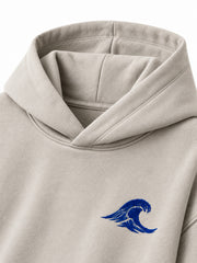 Close-up of the hood and neckline of the Velvet Wave light stone flock print hoodie