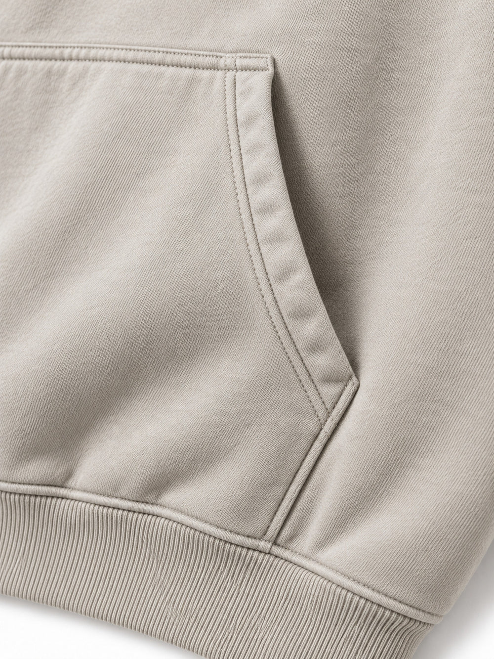 Close-up of the seam stitching of the Velvet Wave light stone flock print hoodie