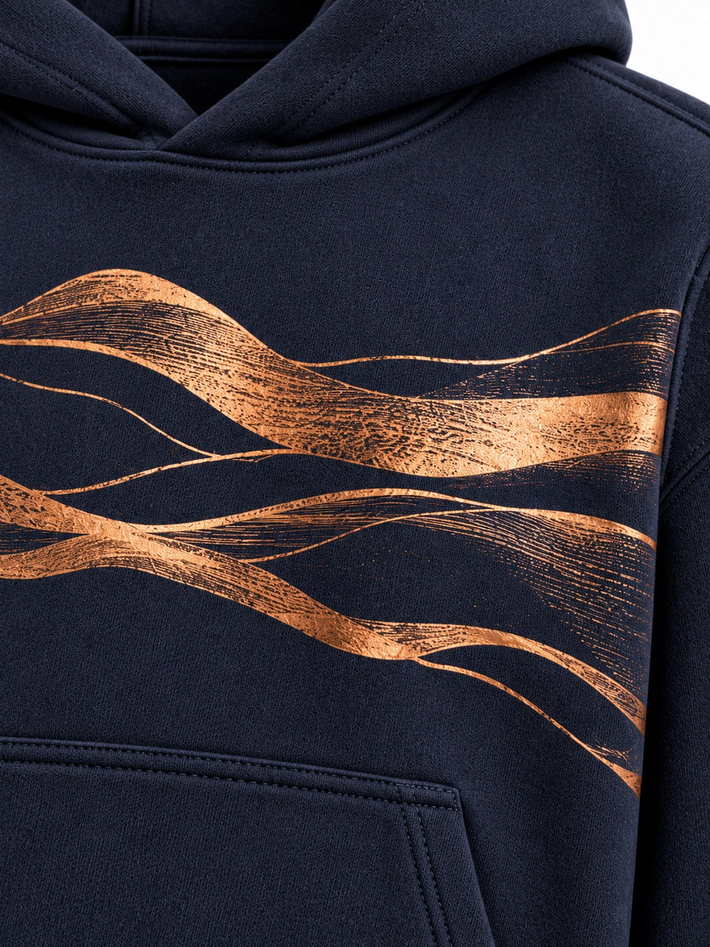 Close-up of the foil print decoration on the Copper Horizon midnight navy foil print oversized hoodie