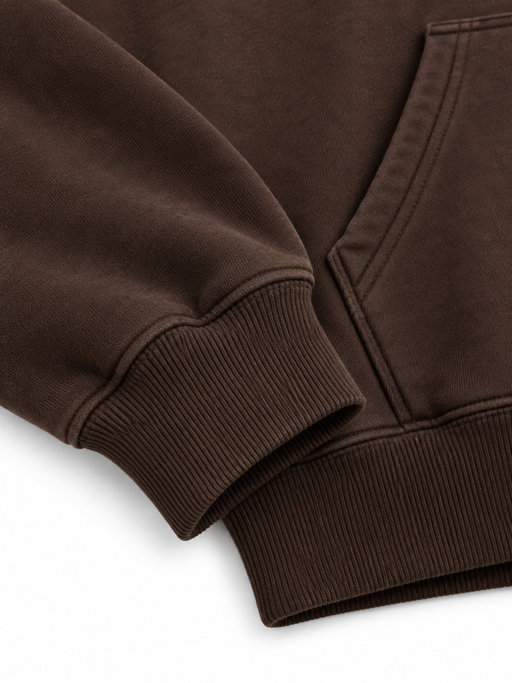 Close-up of the cuff and hem rib of the Copper Orbit espresso brown foil print oversized hoodie