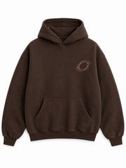 Front view of the Copper Orbit espresso brown foil print oversized hoodie with a small copper-tone orbit at the left chest