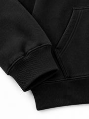 Close-up of the cuff and hem rib of the Liquid Silver black foil print zip-up hoodie