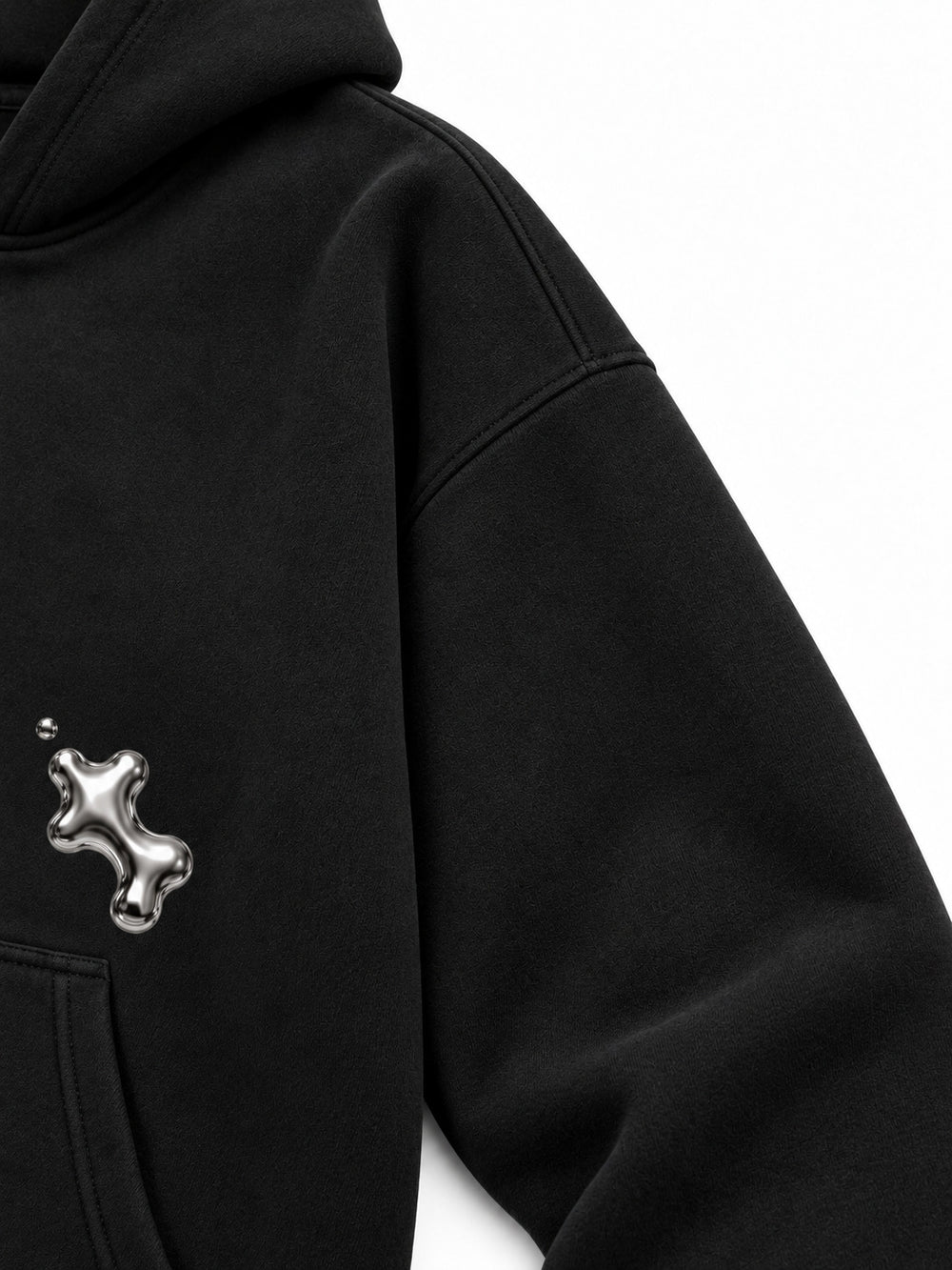 Close-up of the sleeve of the Liquid Silver black foil print zip-up hoodie