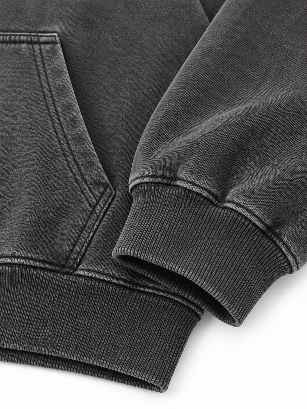 Close-up of the cuff and hem rib of the Prism Chrome charcoal foil print oversized hoodie