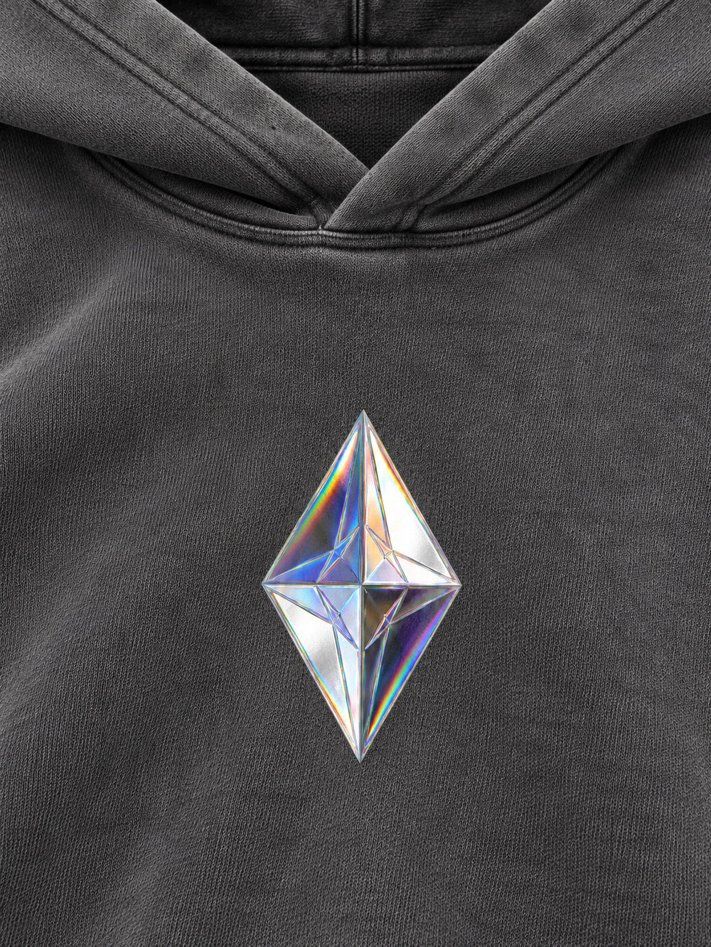Close-up of the foil print decoration on the Prism Chrome charcoal foil print oversized hoodie