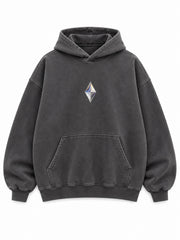 Front view of the Prism Chrome charcoal foil print oversized hoodie with a small faceted prism motif at the chest