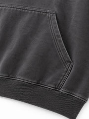 Close-up of the seam stitching of the Prism Chrome charcoal foil print oversized hoodie