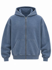 Front view of the Quiet Motion slate blue mineral wash oversized zip-up hoodie with tiny tonal triple-slash mark on the chest