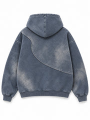 Back view of the Storm Mineral slate blue mineral wash zip-up hoodie with a sweeping curved seam across the mineral-washed back