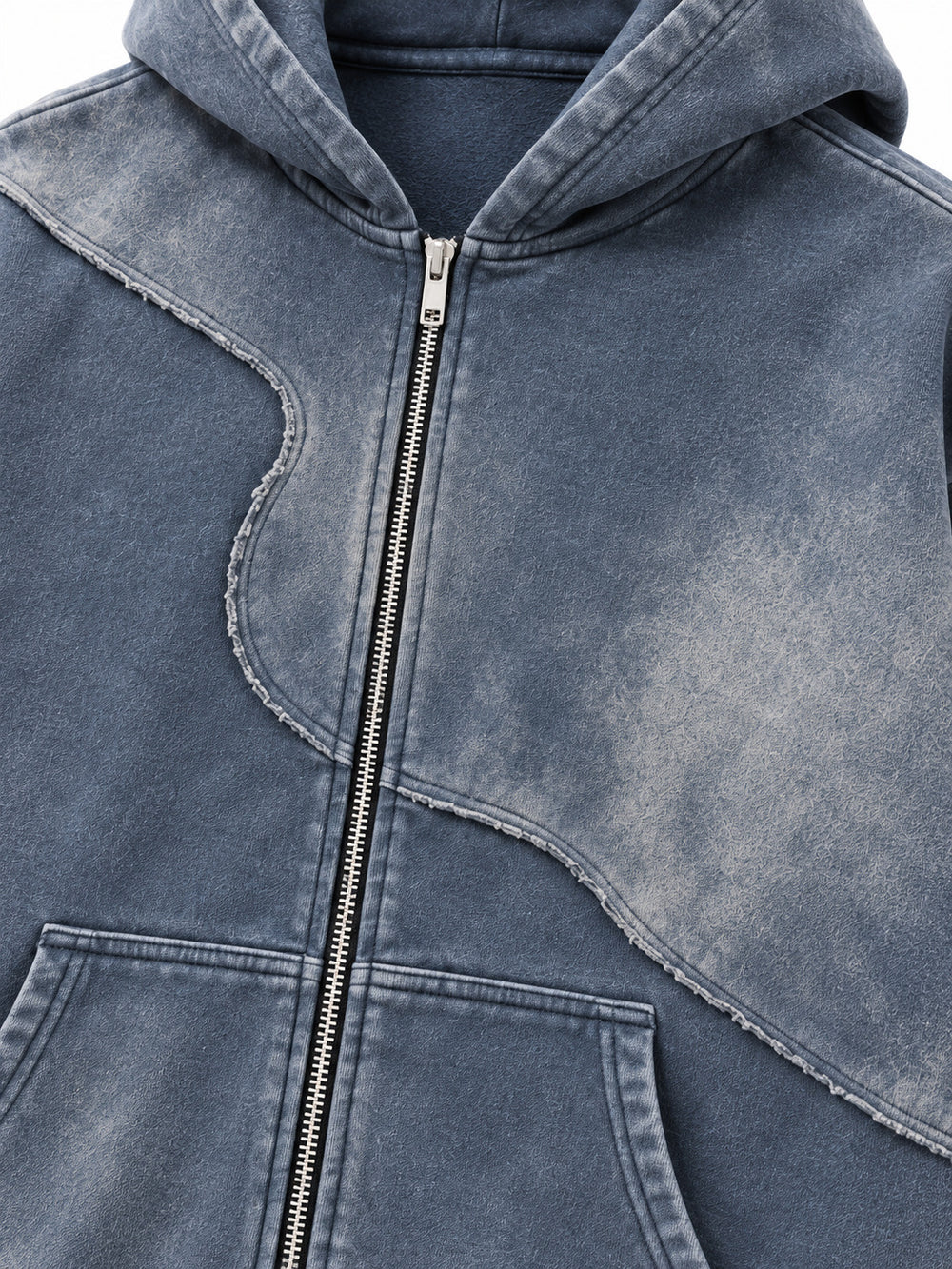 Close-up of the mineral wash decoration on the Storm Mineral slate blue mineral wash zip-up hoodie