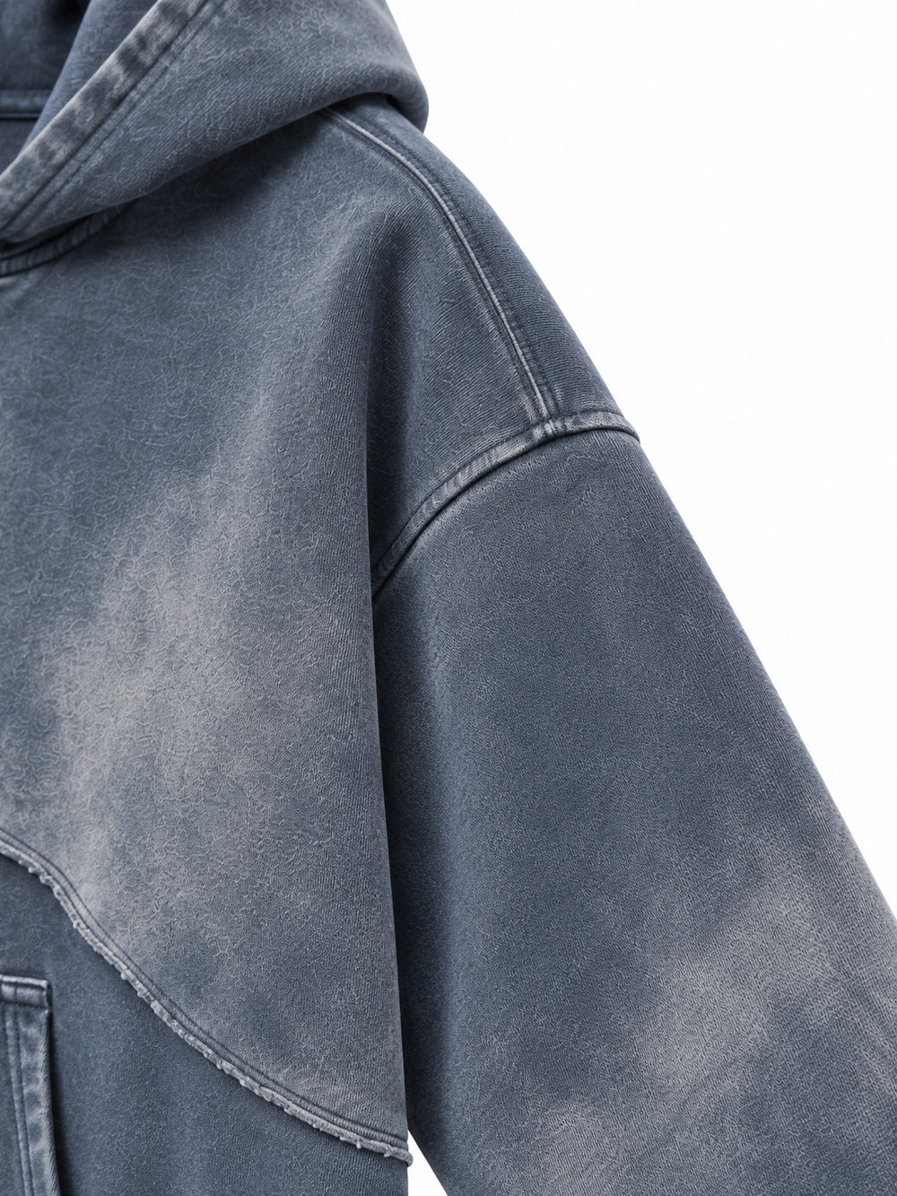 Close-up of the sleeve of the Storm Mineral slate blue mineral wash zip-up hoodie