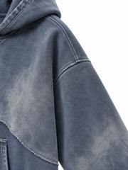 Close-up of the sleeve of the Storm Mineral slate blue mineral wash zip-up hoodie