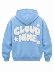 Back view of the Cloud Nine sky blue puff print oversized hoodie with large white CLOUD NINE lettering with three stars in puff print