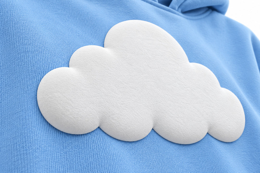 Close-up of the puff print decoration on the Cloud Nine sky blue puff print oversized hoodie