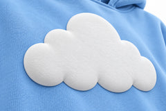 Close-up of the puff print decoration on the Cloud Nine sky blue puff print oversized hoodie