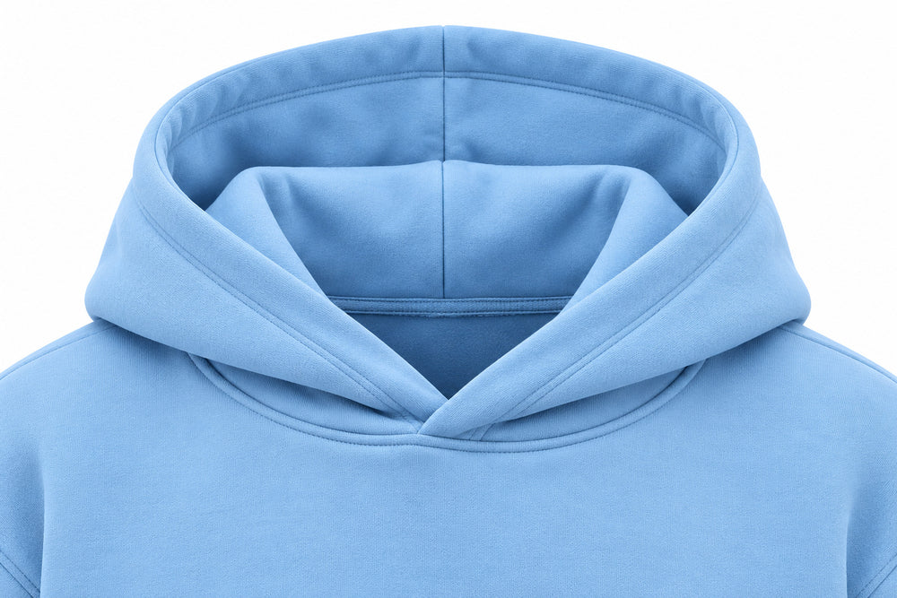 Close-up of the hood and neckline of the Cloud Nine sky blue puff print oversized hoodie
