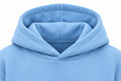 Close-up of the hood and neckline of the Cloud Nine sky blue puff print oversized hoodie