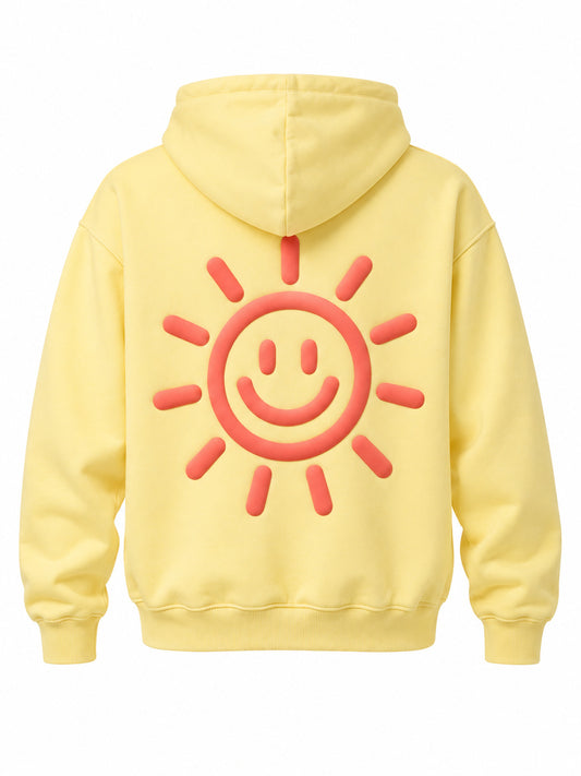 Back view of the Day Off butter yellow puff print hoodie with large coral smiling-sun outline in puff print