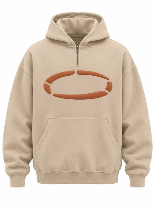 Front view of the Dune Pulse sand puff print oversized quarter-zip hoodie with rust puff-print ring made of broken segments across the chest