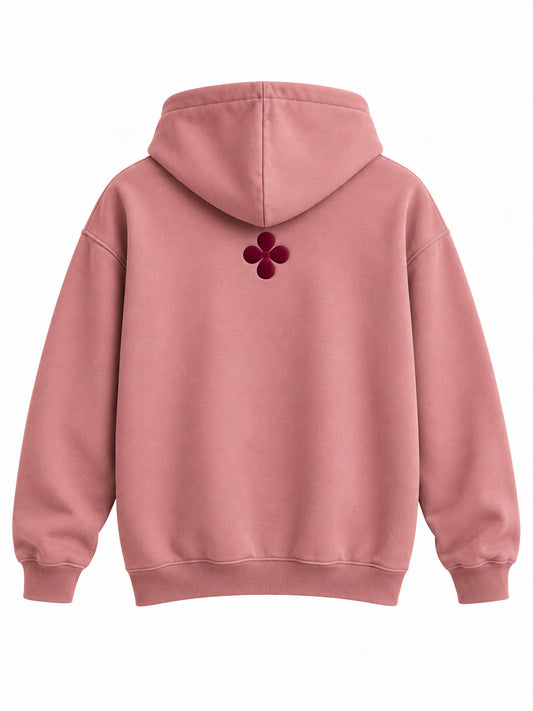 Back view of the Good Space dusty rose puff print hoodie with small burgundy four-petal flower in puff print