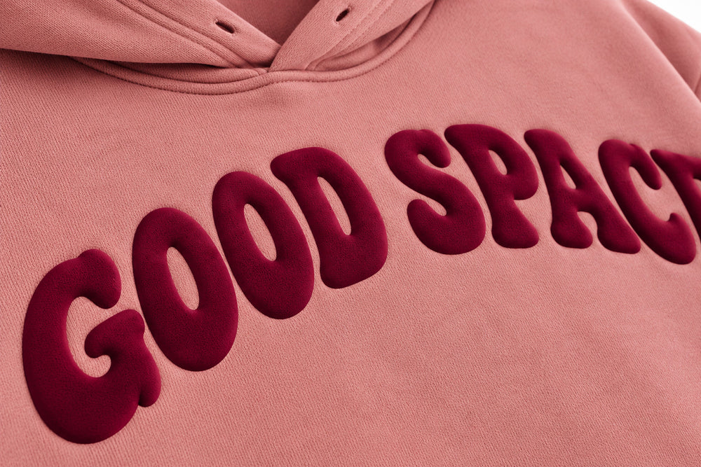 Close-up of the puff print decoration on the Good Space dusty rose puff print hoodie