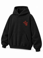 Front three-quarter view of the Lava Lines black puff print boxy hoodie