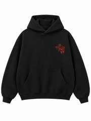 Front view of the Lava Lines black puff print boxy hoodie with a small vermilion lava-line motif at the left chest
