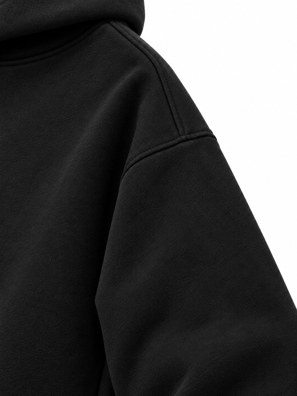 Close-up of the sleeve of the Lava Lines black puff print boxy hoodie