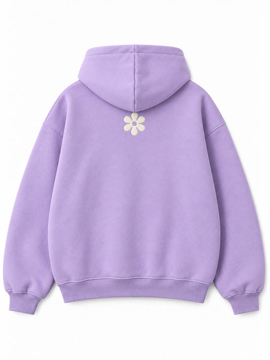 Back view of the Lilac Bloom lilac puff print oversized hoodie with a smaller ivory daisy below the hood