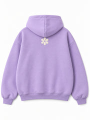 Back view of the Lilac Bloom lilac puff print oversized hoodie with a smaller ivory daisy below the hood