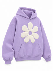 Front three-quarter view of the Lilac Bloom lilac puff print oversized hoodie