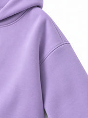 Close-up of the sleeve of the Lilac Bloom lilac puff print oversized hoodie