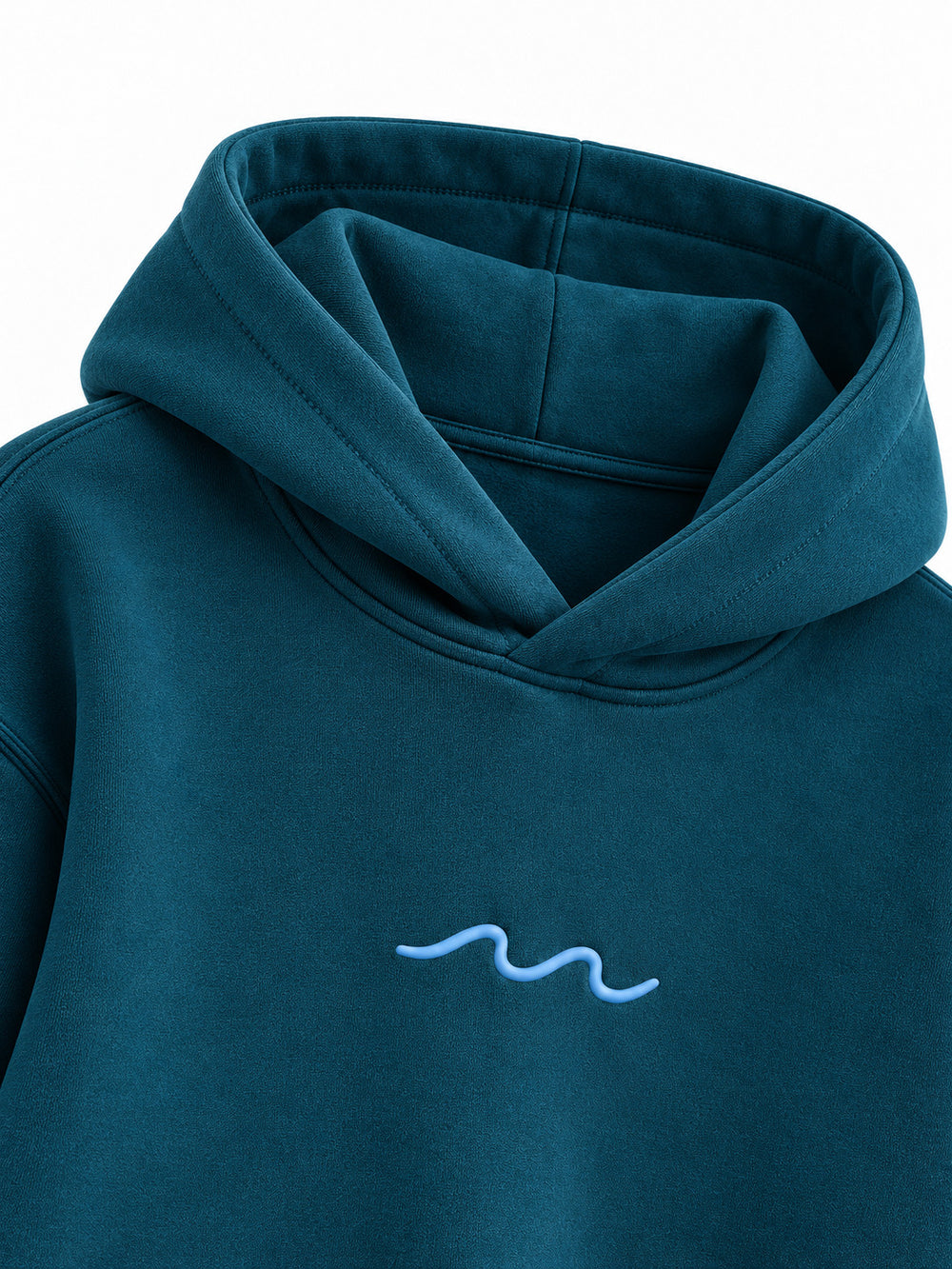 Close-up of the hood and neckline of the Ocean Pulse deep teal puff print hoodie