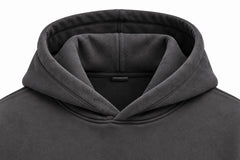 Close-up of the hood and neckline of the Off Grid charcoal puff print boxy hoodie