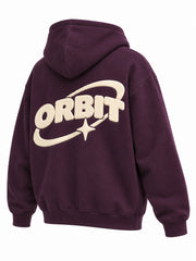 Rear three-quarter view of the Orbit dark plum puff print oversized hoodie