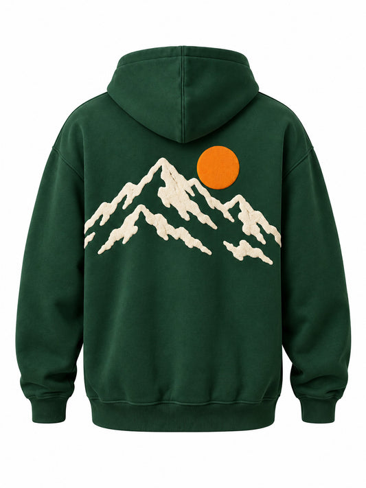 Back view of the Outside pine green puff print hoodie with cream mountain silhouette with an orange puff-print sun
