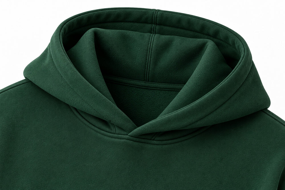 Close-up of the hood and neckline of the Outside pine green puff print hoodie