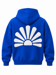 Back view of the Rise cobalt blue puff print boxy hoodie with large rounded white sunburst in puff print