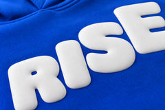 Close-up of the puff print decoration on the Rise cobalt blue puff print boxy hoodie