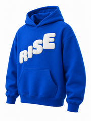 Front three-quarter view of the Rise cobalt blue puff print boxy hoodie