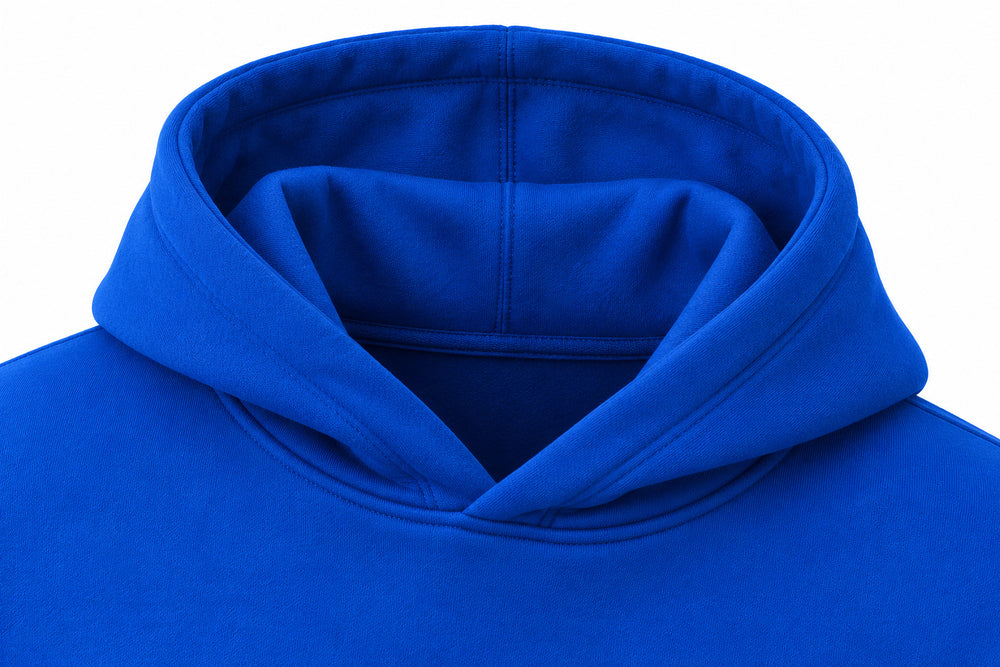 Close-up of the hood and neckline of the Rise cobalt blue puff print boxy hoodie