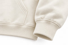 Close-up of the seam stitching of the Shift Mode ivory puff print oversized hoodie
