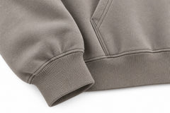 Close-up of the seam stitching of the Slow Motion warm gray puff print oversized hoodie